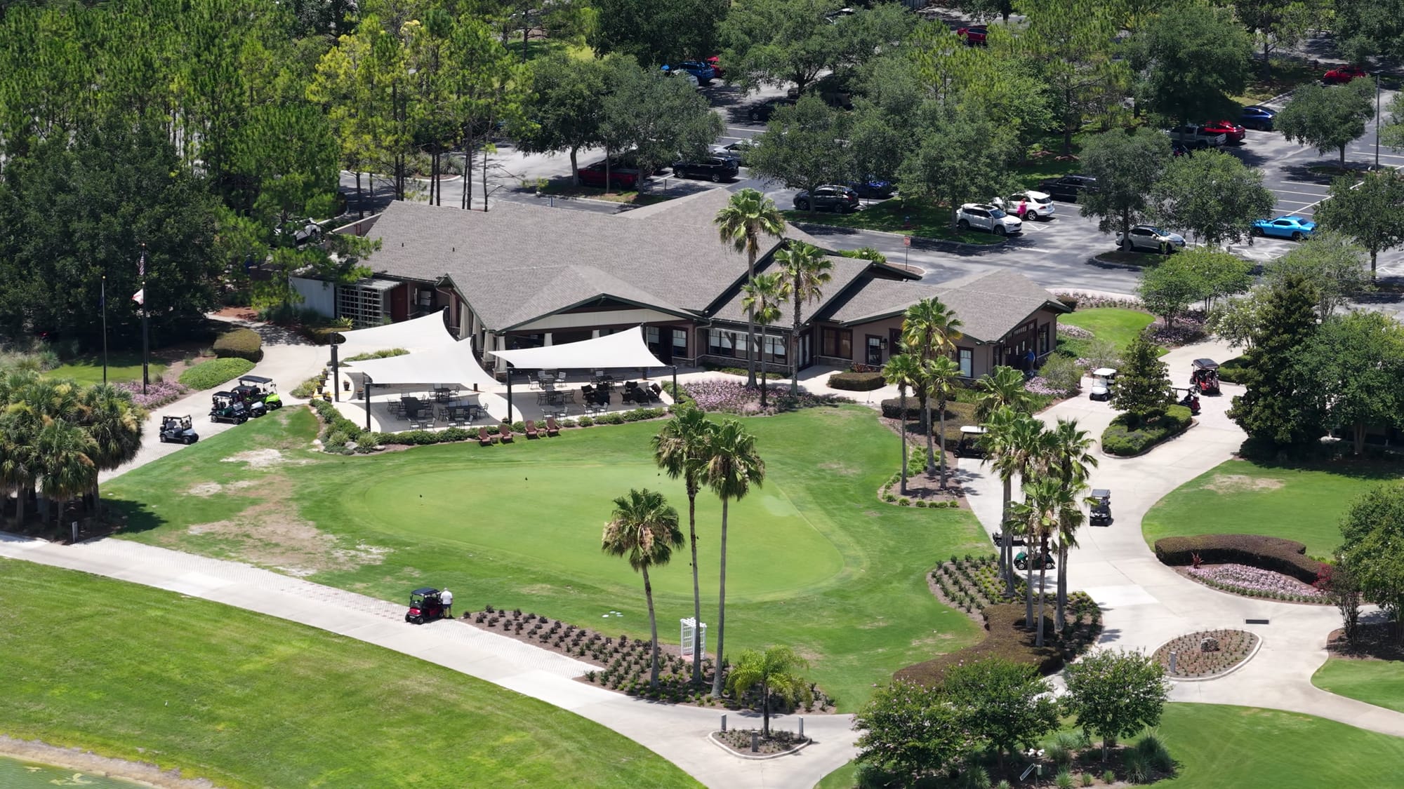 Del Webb Stone Creek clubhouse - Aerial drone shot of the golf clubhouse and practi