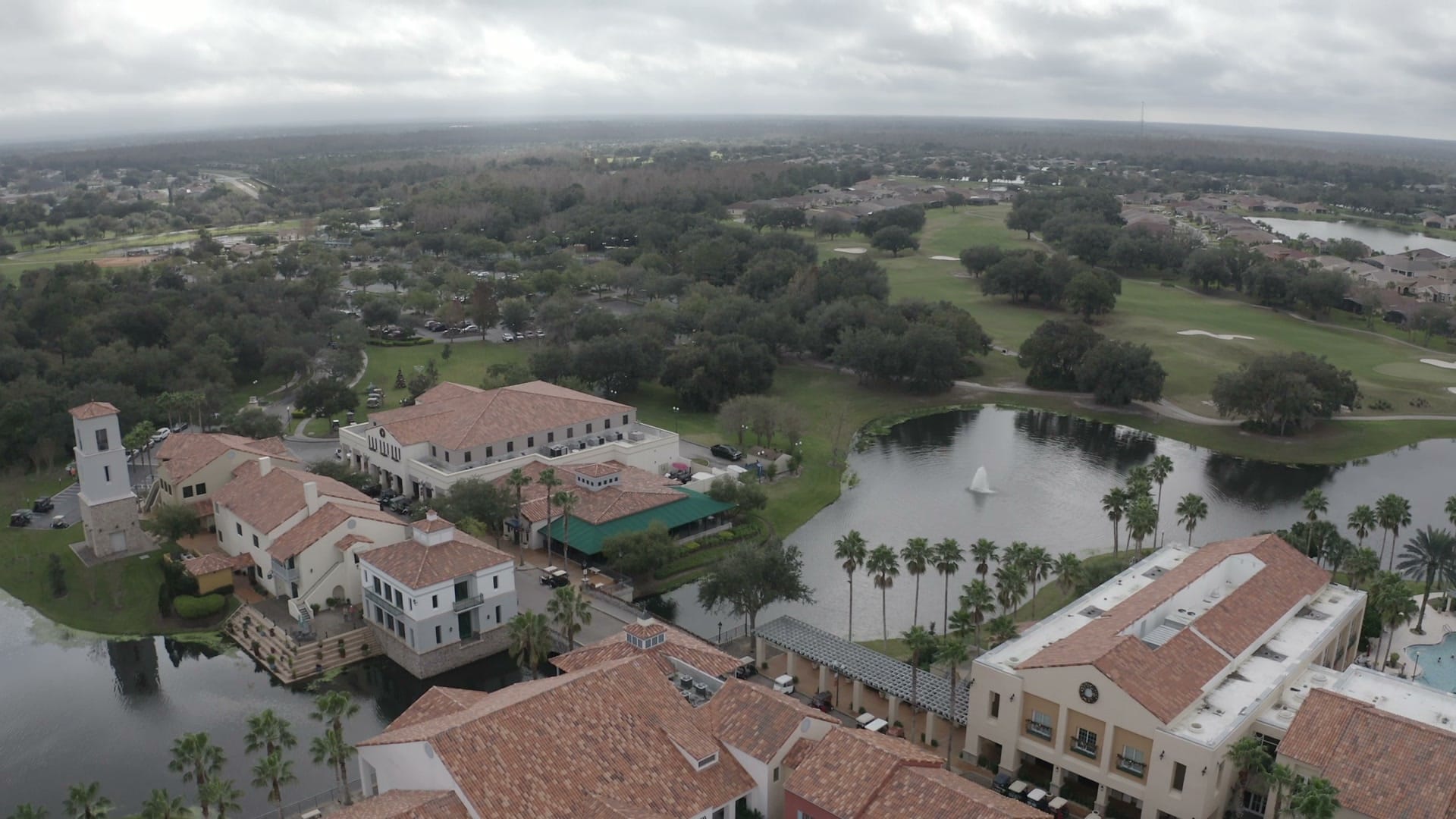 Solivita clubhouse - Aerial drone shot pulling away from the Solivita c