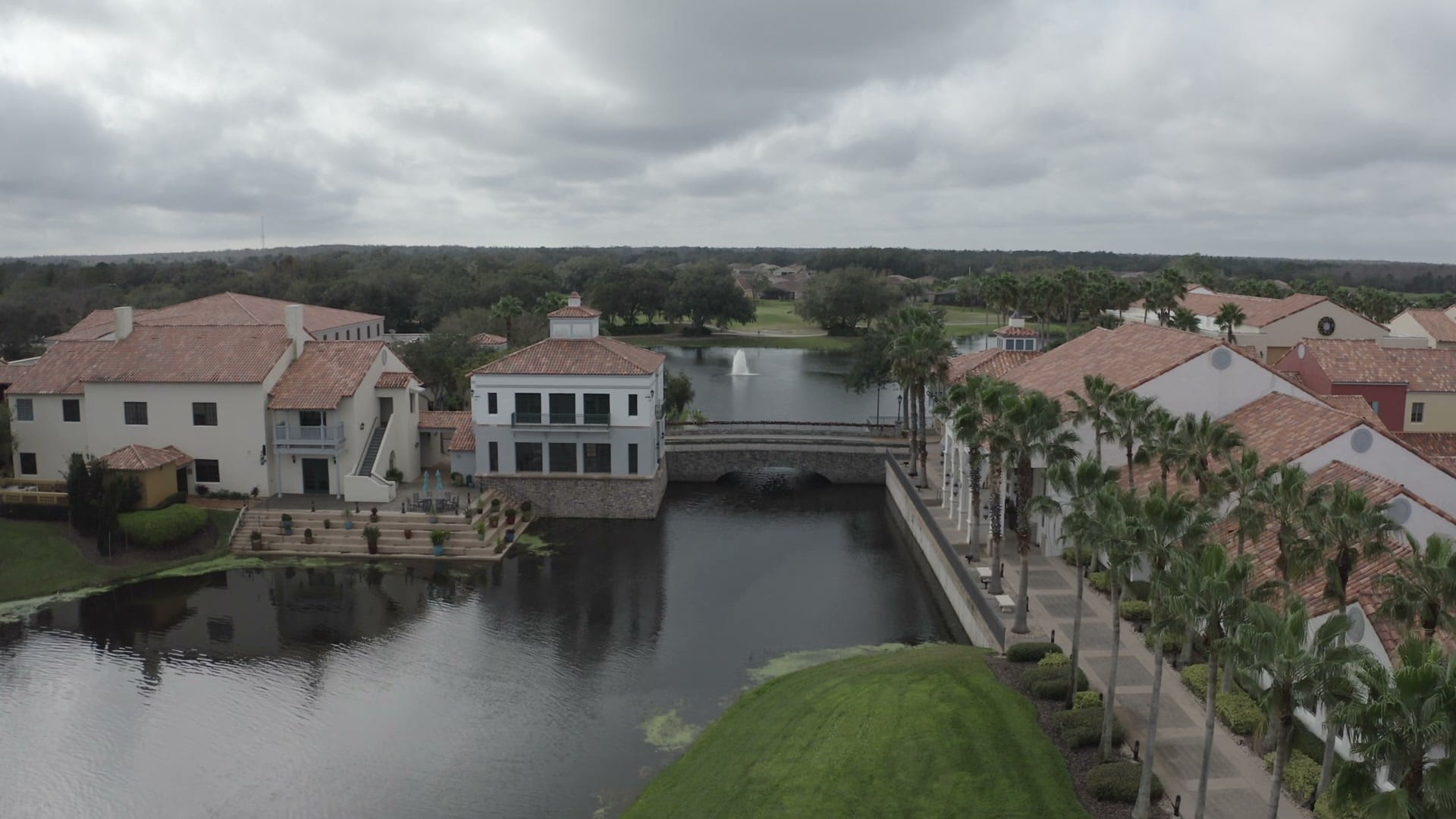 Solivita clubhouse - Aerial drone shot starting with a wide view of the